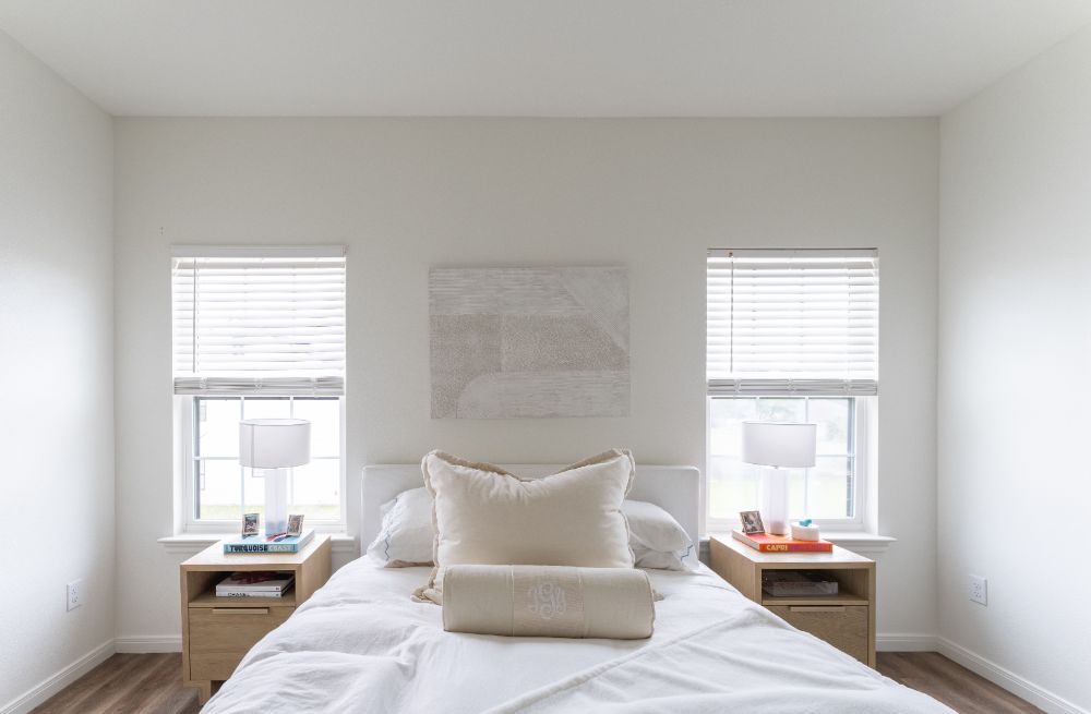 Organized white cabinetry in housing